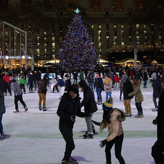 The ice rink and holiday shopping kiosks at the Bryant Park Winter Village in Manhattan.
